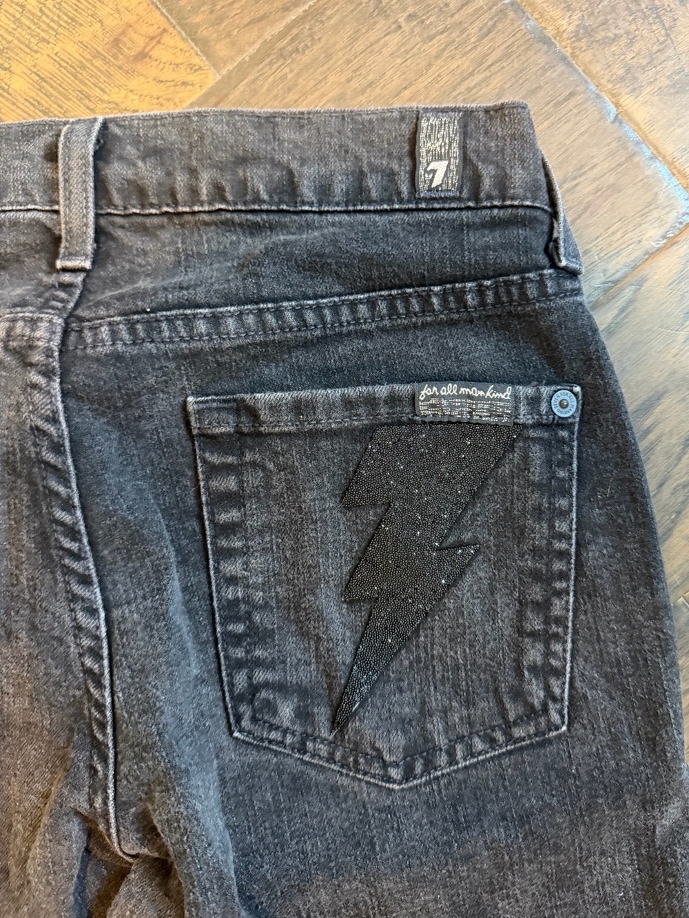 7 For All Mankind Black Flare Jeans with Lightning Bolt Back Pockets